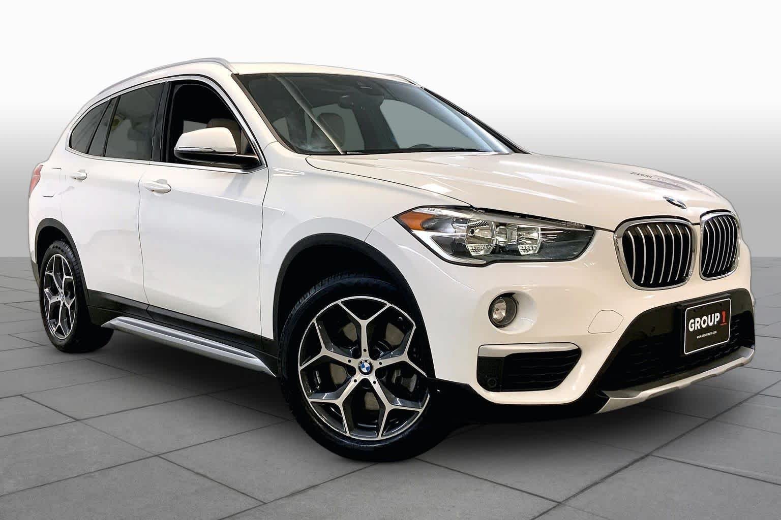 Used 2019 BMW X1 28i with VIN WBXHT3C55K5L38571 for sale in Kansas City