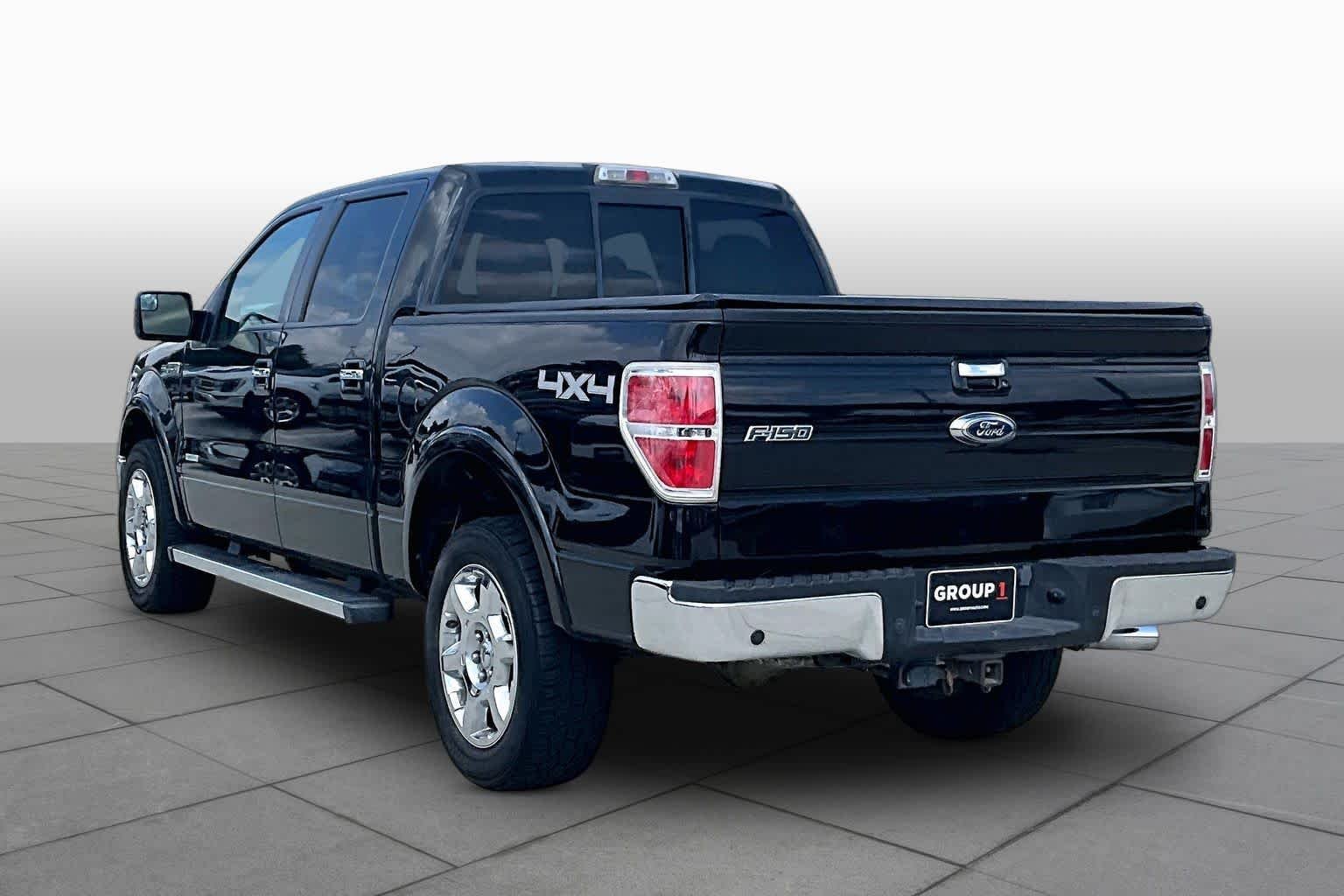 Used 2013 Tuxedo Black Metallic Ford Lariat image 10