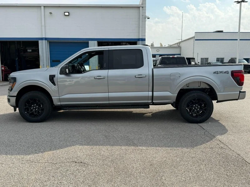 New 2026 Iconic Silver Metallic Ford XLT 4WD SuperCrew 6.5