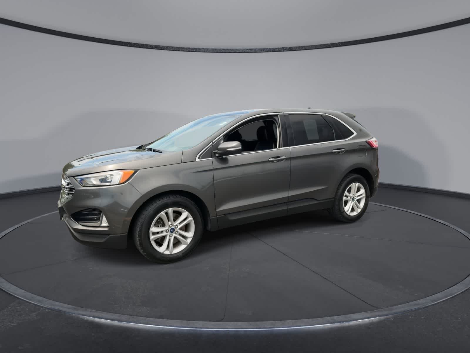 Used 2020 Magnetic Metallic Ford SEL image 4