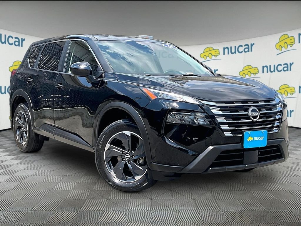 Used 2024 Black Nissan SV image 1