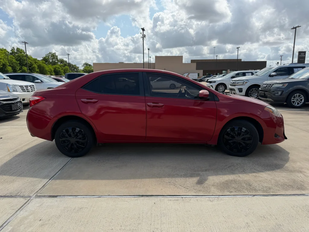 Used 2017 Barcelona Red Metallic Toyota LE image 7