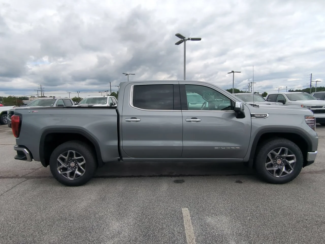 New 2026 Sterling Metallic GMC SLT image 3