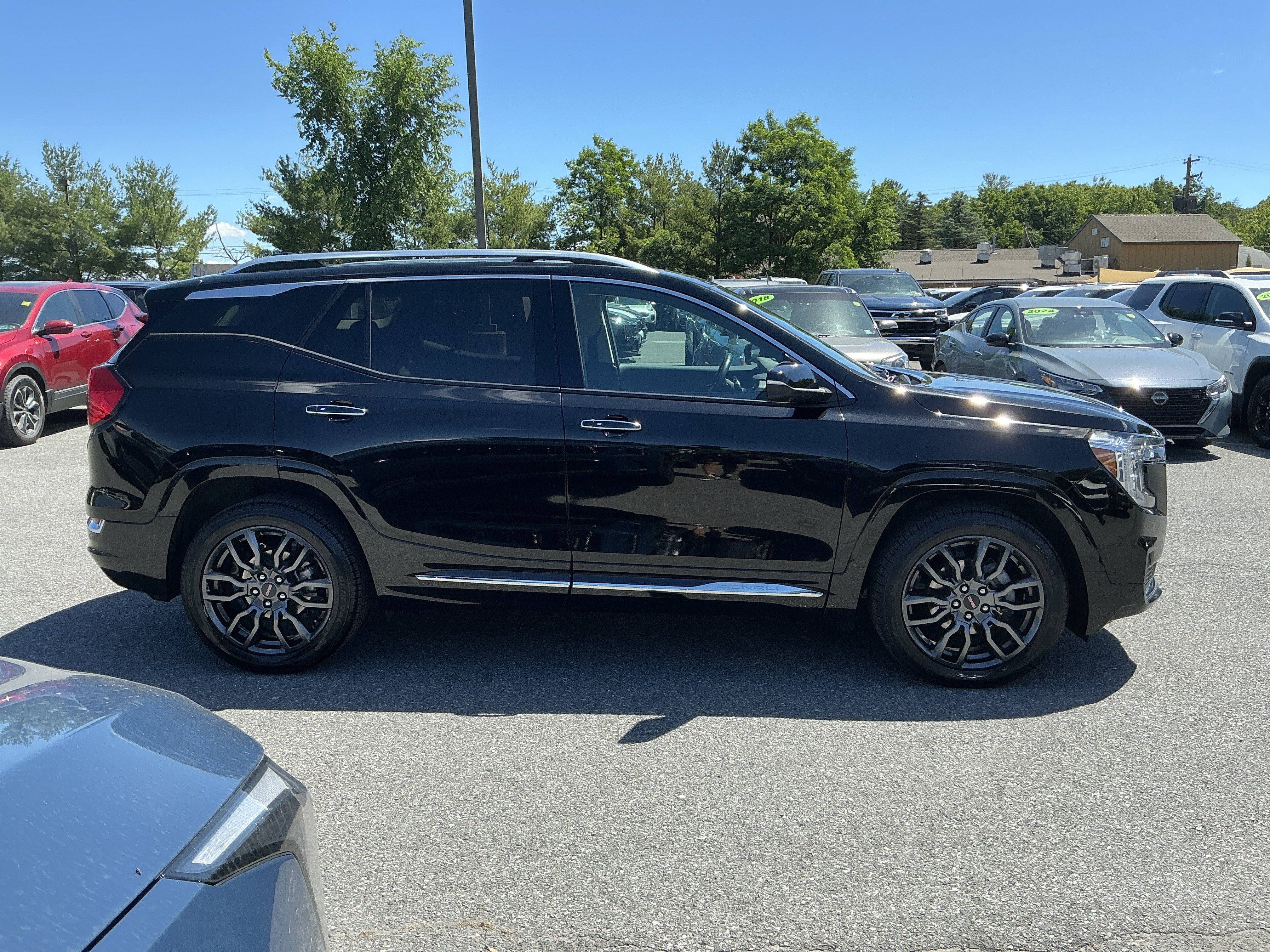 Used 2023 Ebony Twilight Metallic GMC Denali image 2