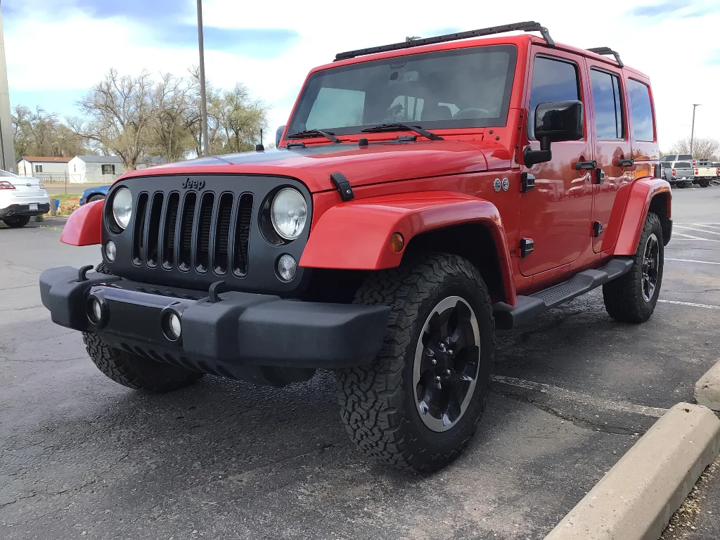 Used 2014 Red Jeep Unlimited Sahara image 3