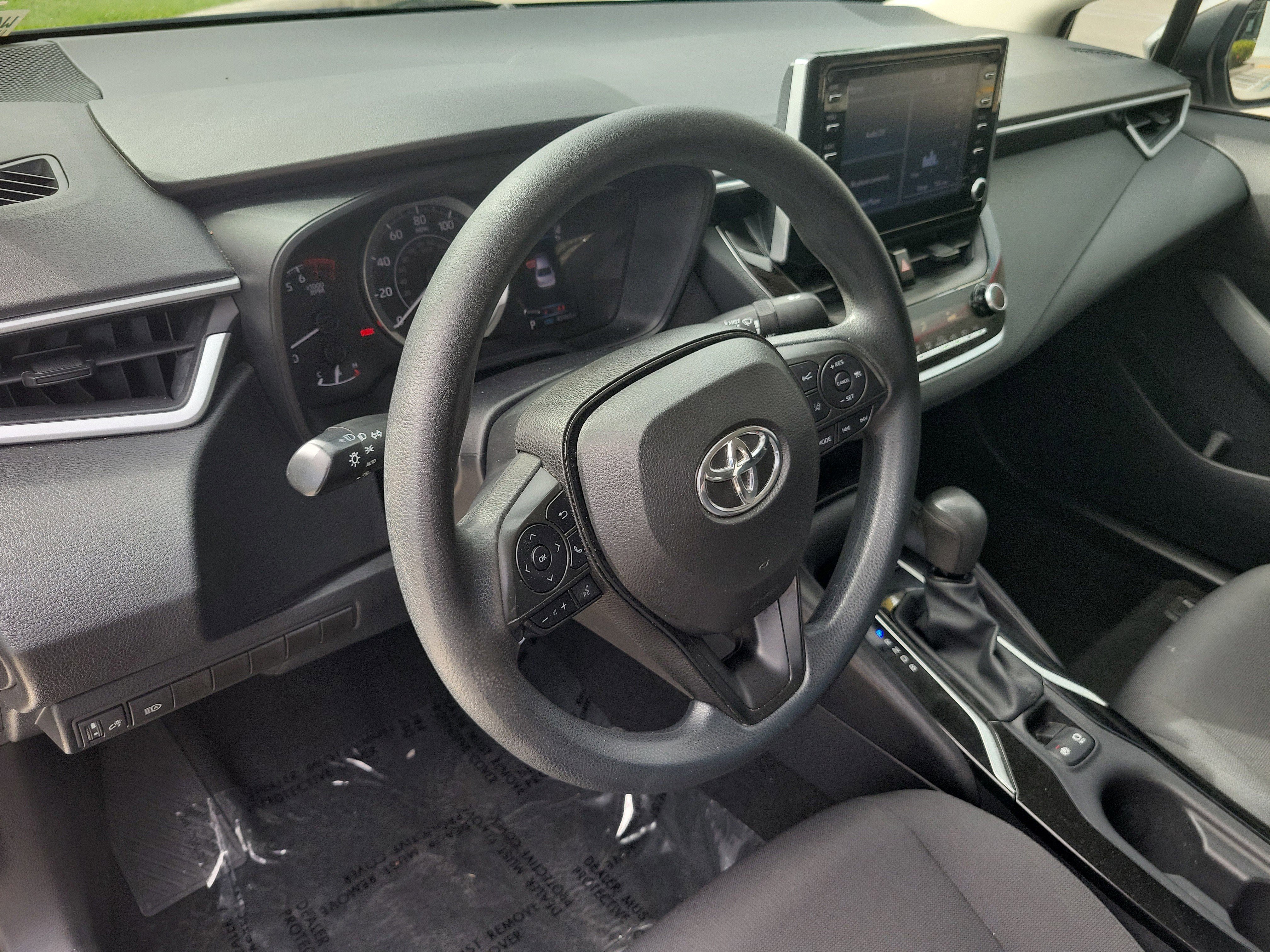 Used 2020 Classic Silver Metallic Toyota LE image 24