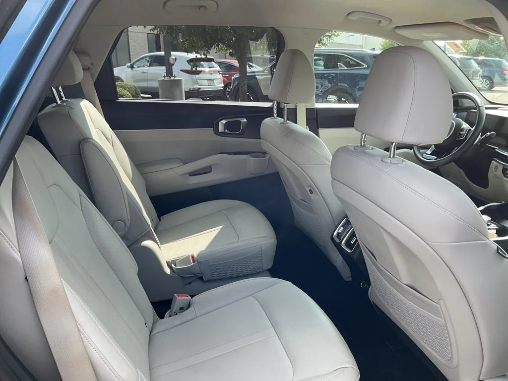 Used 2025 Mineral Blue Kia EX image 7
