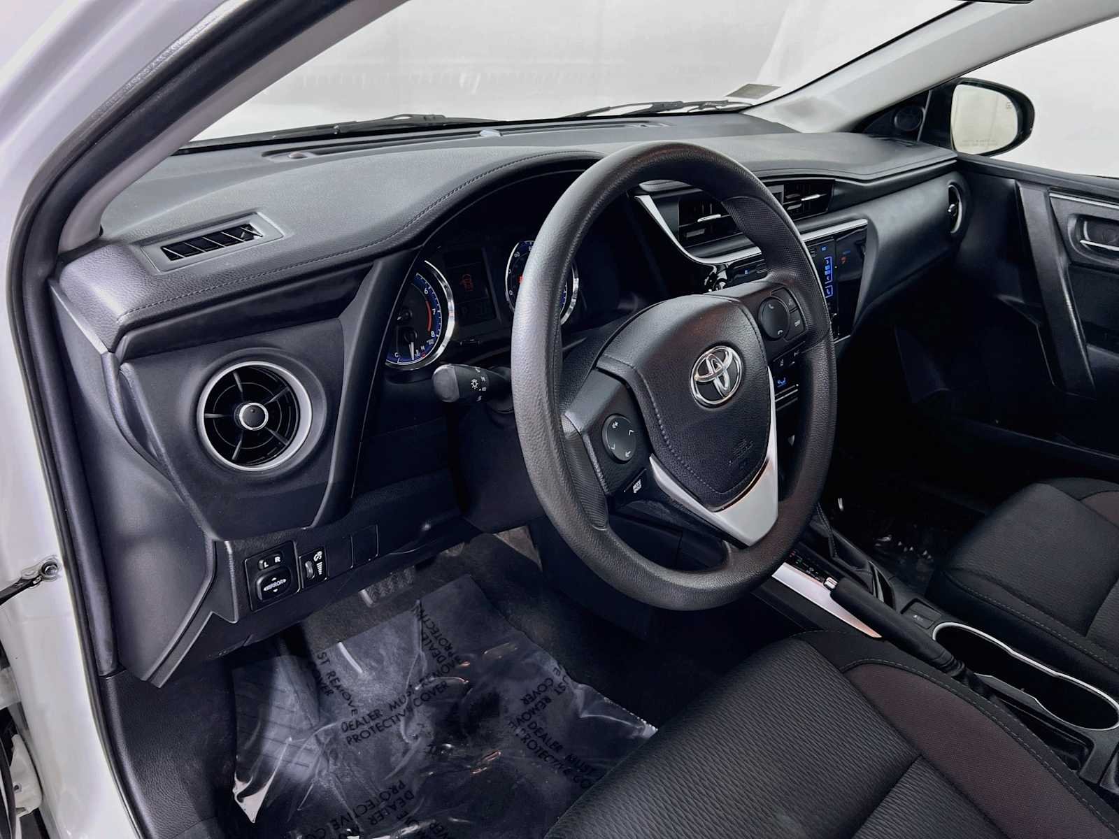 Used 2018 Super White Toyota LE image 9