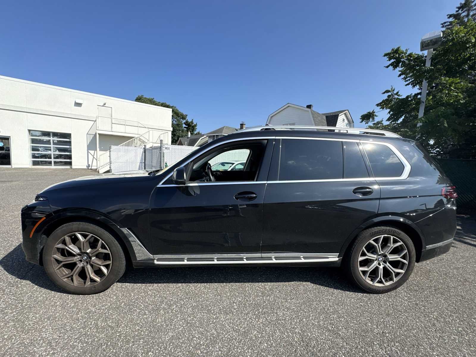 Certified Used 2024 Black Sapphire Metallic BMW xDrive40i image 4