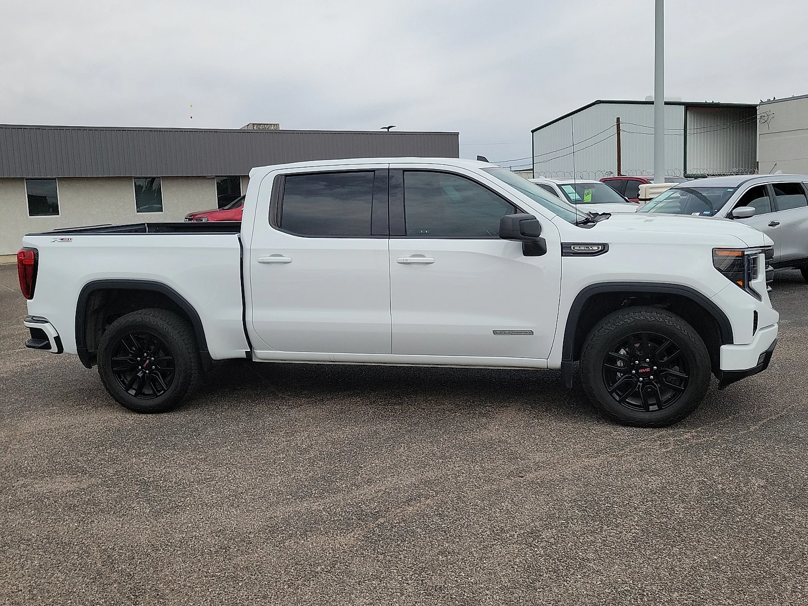 Certified Used 2024 Summit White GMC 4WD Crew Cab Short Box Elevation with 3SB image 12