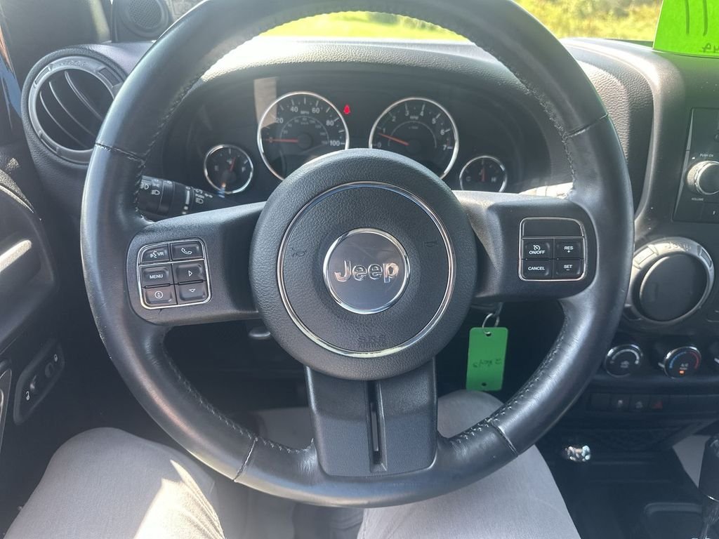 Used 2014 Black Jeep Unlimited Sport image 20