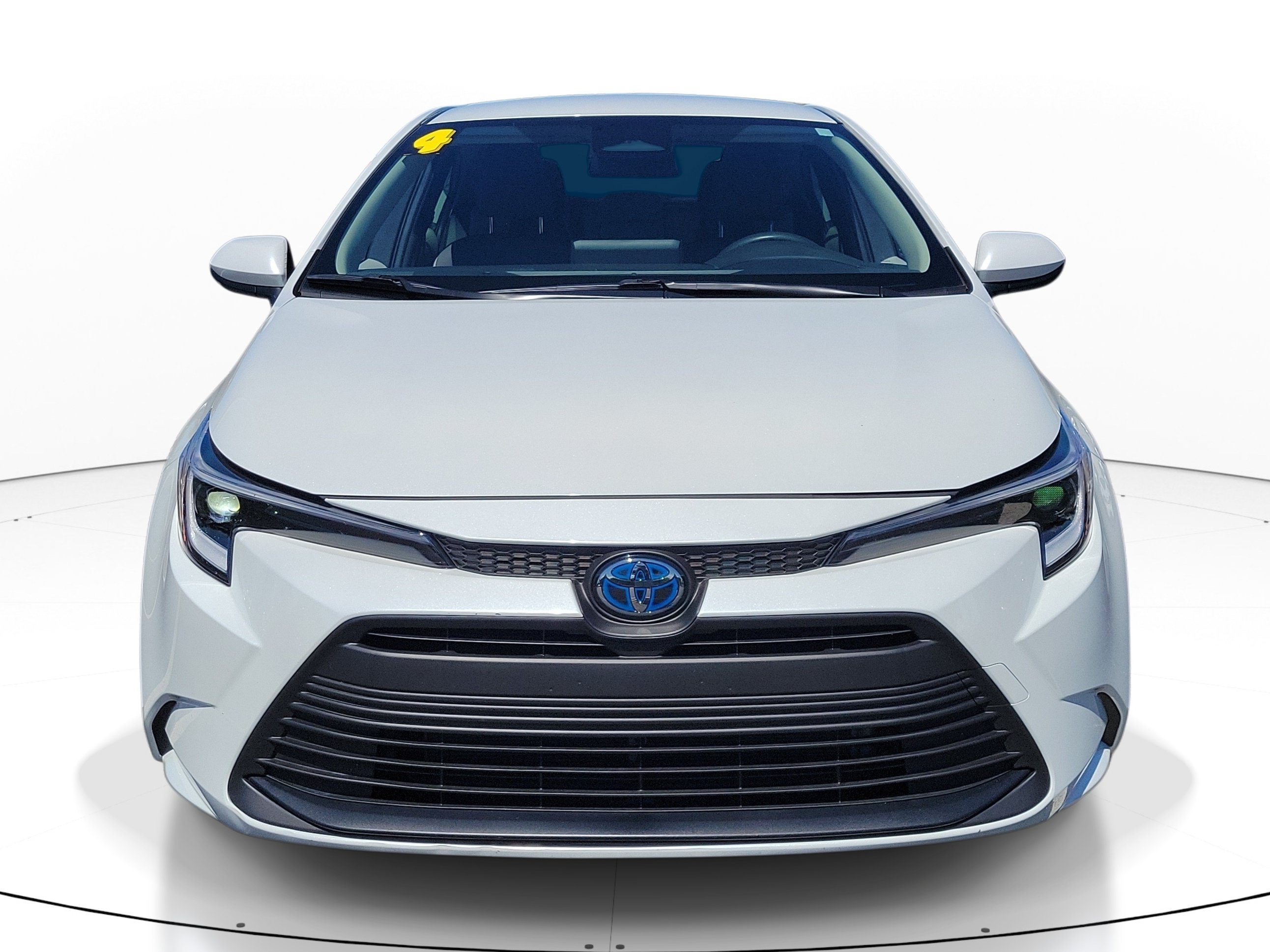 Used 2024 Pearl Toyota LE image 1