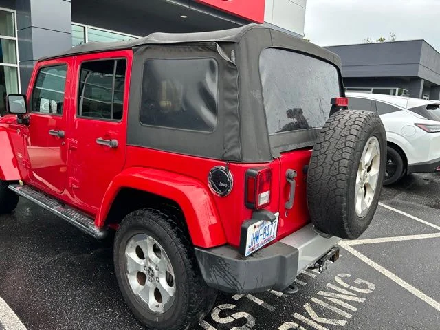 Used 2014 Red Jeep Unlimited Sahara image 6