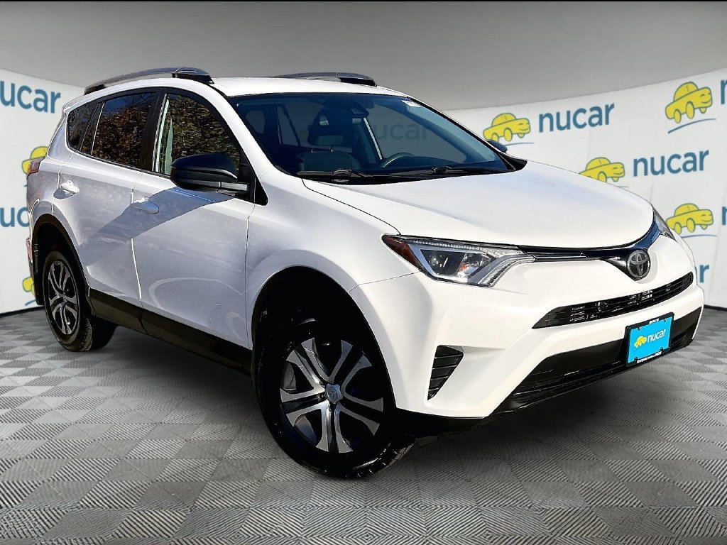 Used 2018 White Toyota LE image 1