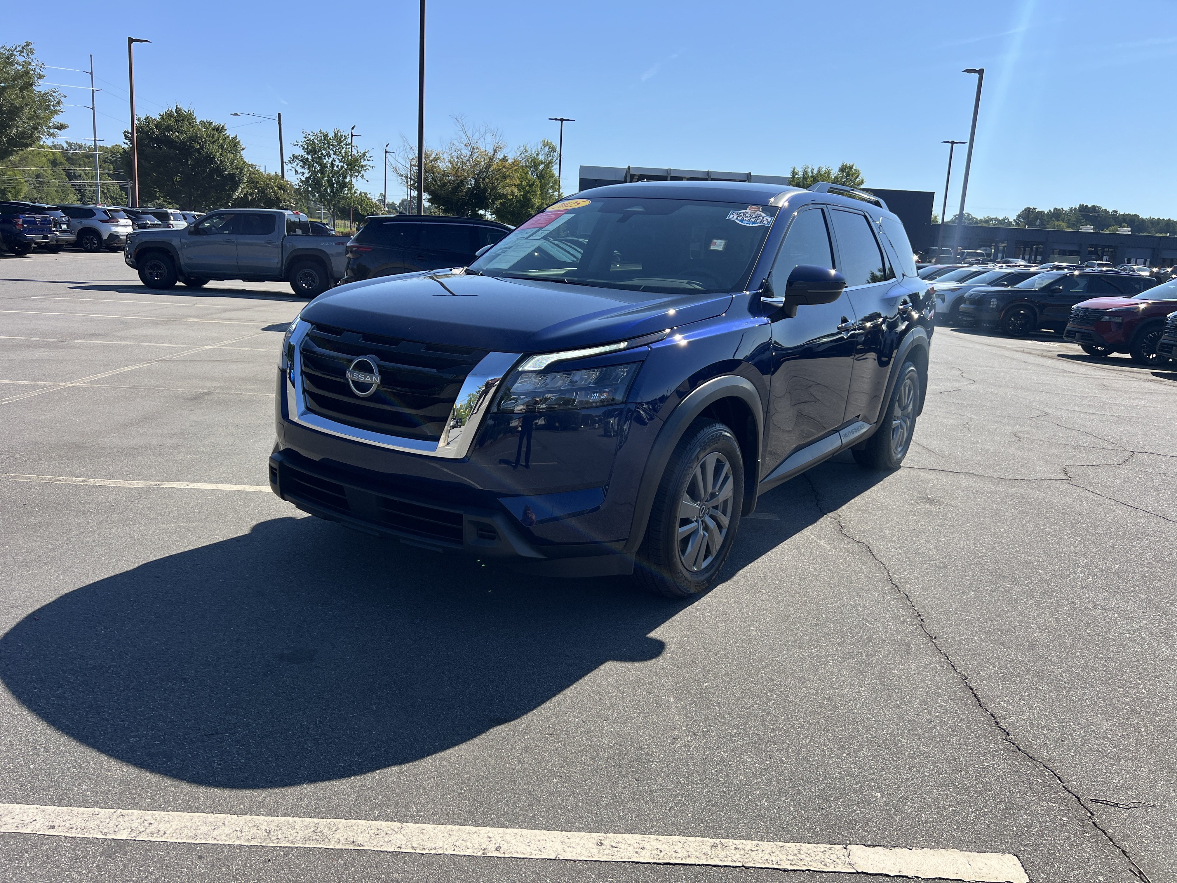 Used 2025 Deep Ocean Blue Pearl Nissan SV image 1