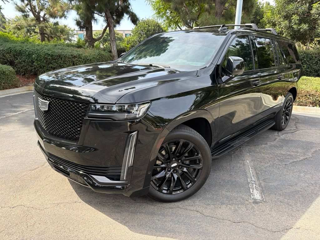 Used 2024 Black Raven Cadillac Sport Platinum image 1