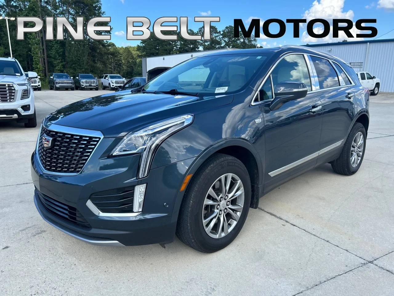 Used 2021 SHADOW METALLIC Cadillac FWD Premium Luxury image 1