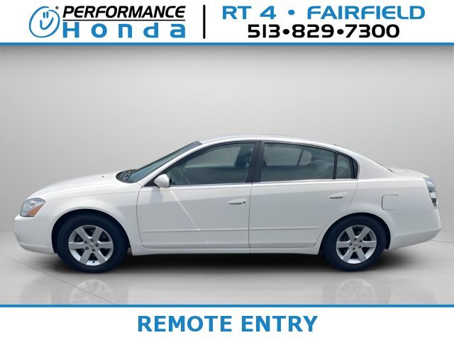 Used 2003 Cloud White Nissan S image 1