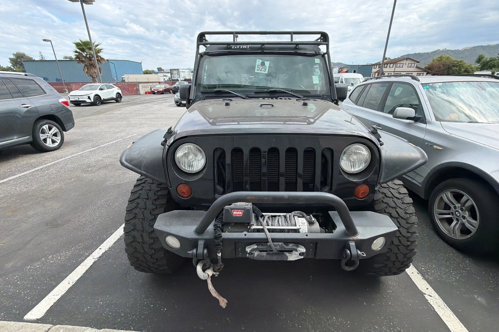 Used 2013 Black Jeep Unlimited Sport image 3