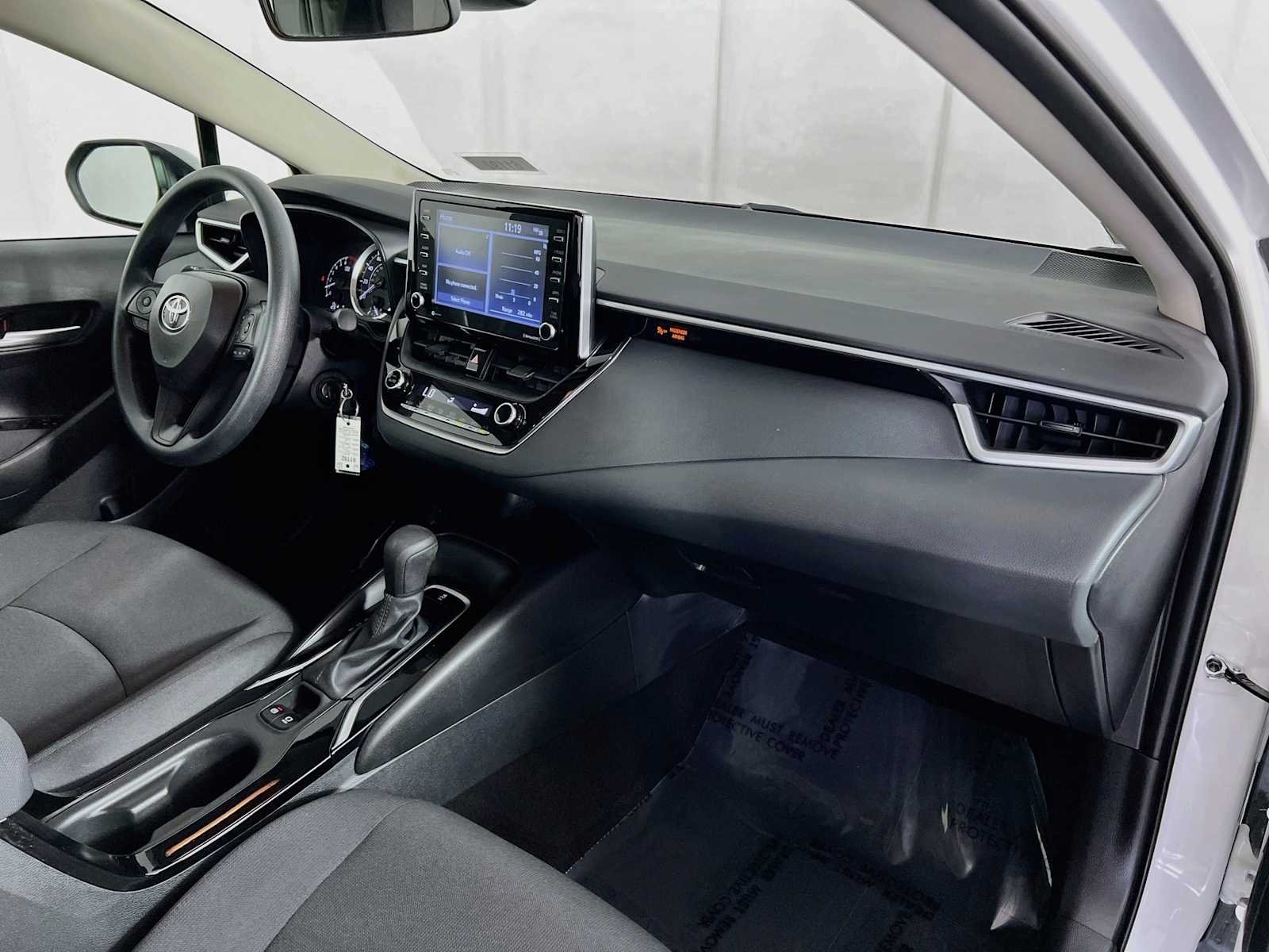 Used 2021 Super White Toyota LE image 27