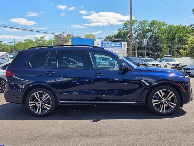Used 2024 Tanzanite Blue II Metallic BMW xDrive40i image 4