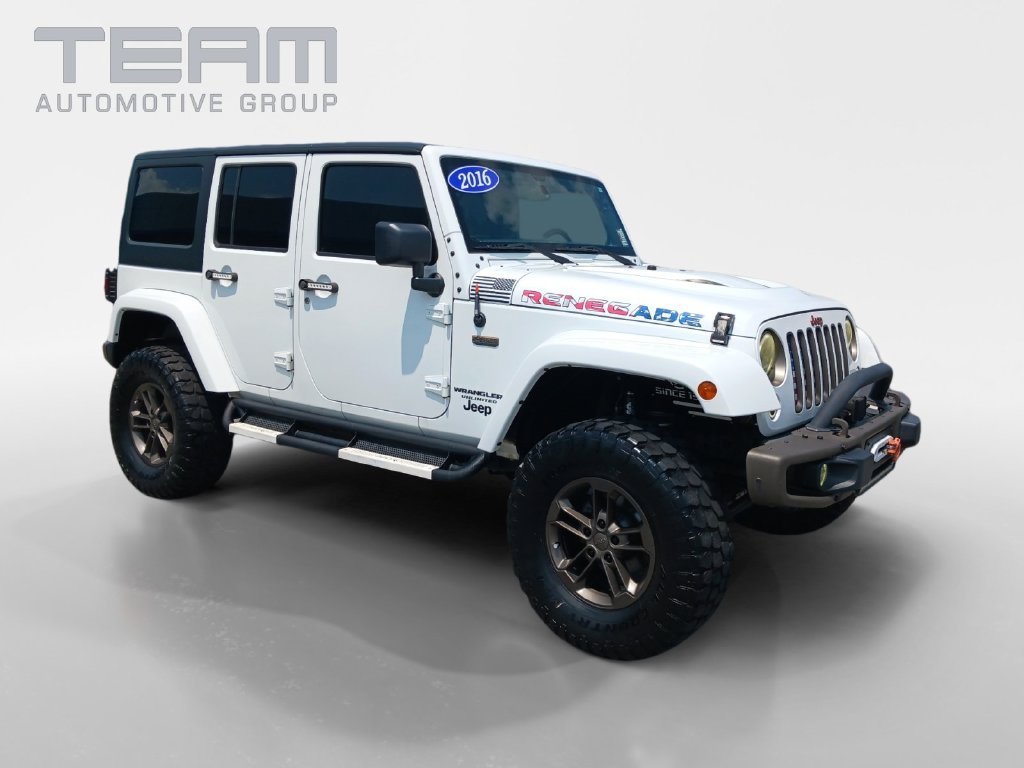 Used 2016 White Jeep Unlimited Sahara image 1