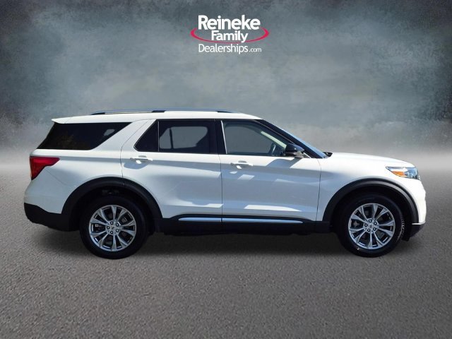 Used 2023 White Metallic Ford Limited image 4