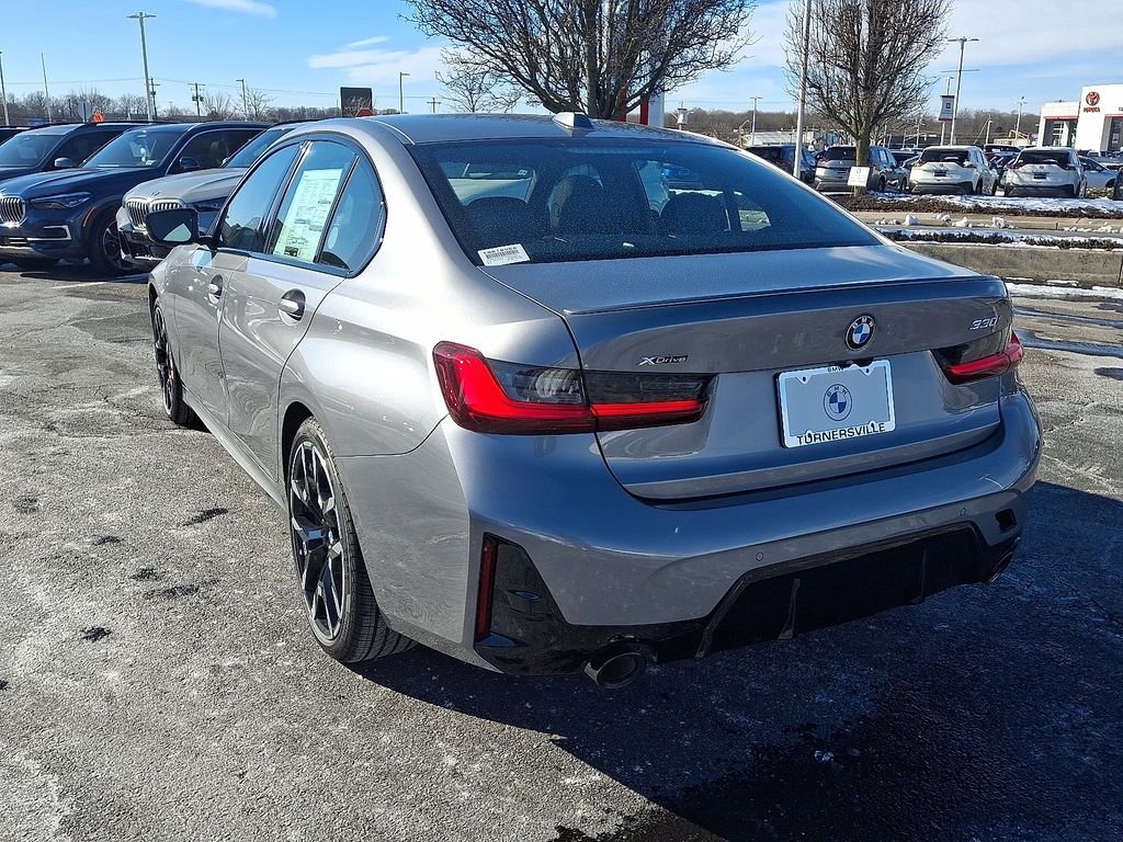 Used 2026 Skyscraper Grey Metallic BMW 330i xDrive image 3