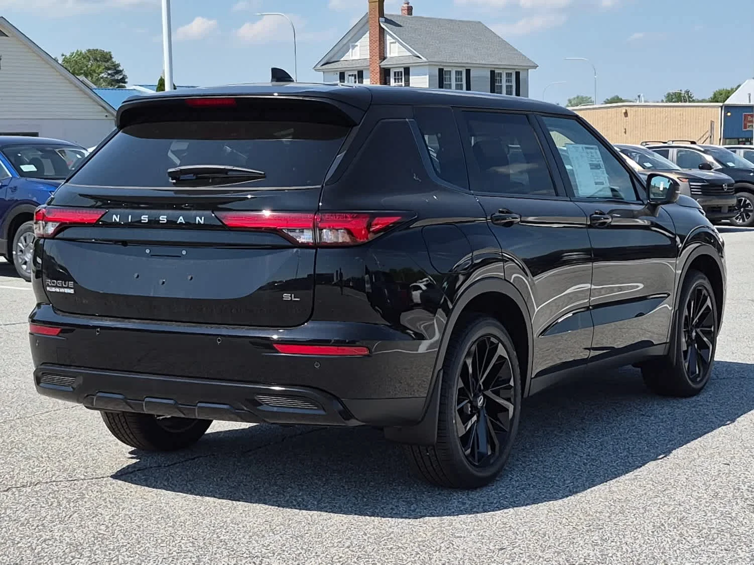 New 2026 Cosmic Black Nissan SL image 3