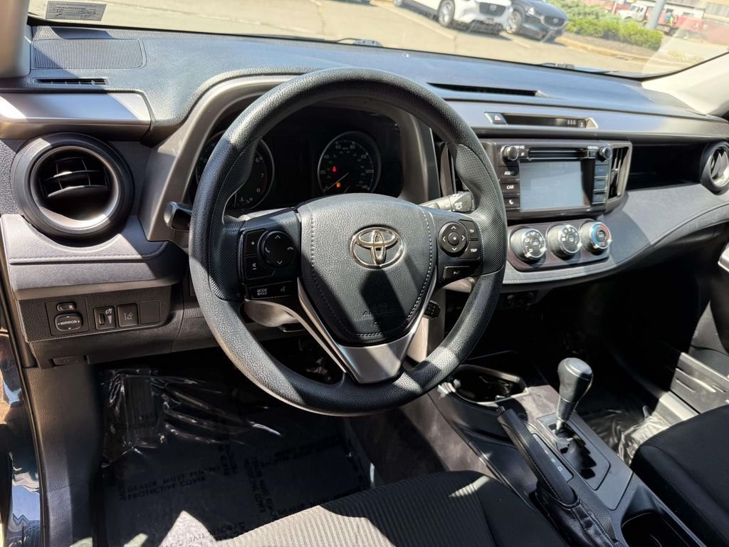 Used 2018 Blue Toyota LE image 2