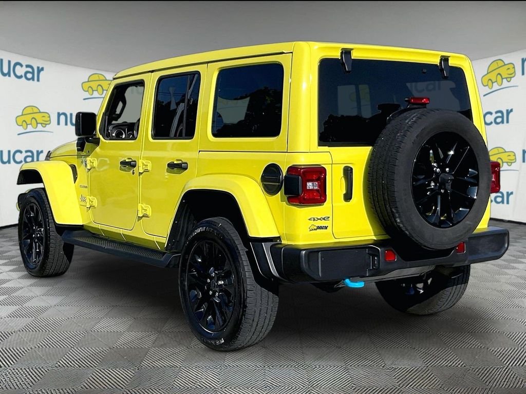 Used 2024 Yellow Jeep Sahara 4xe image 4
