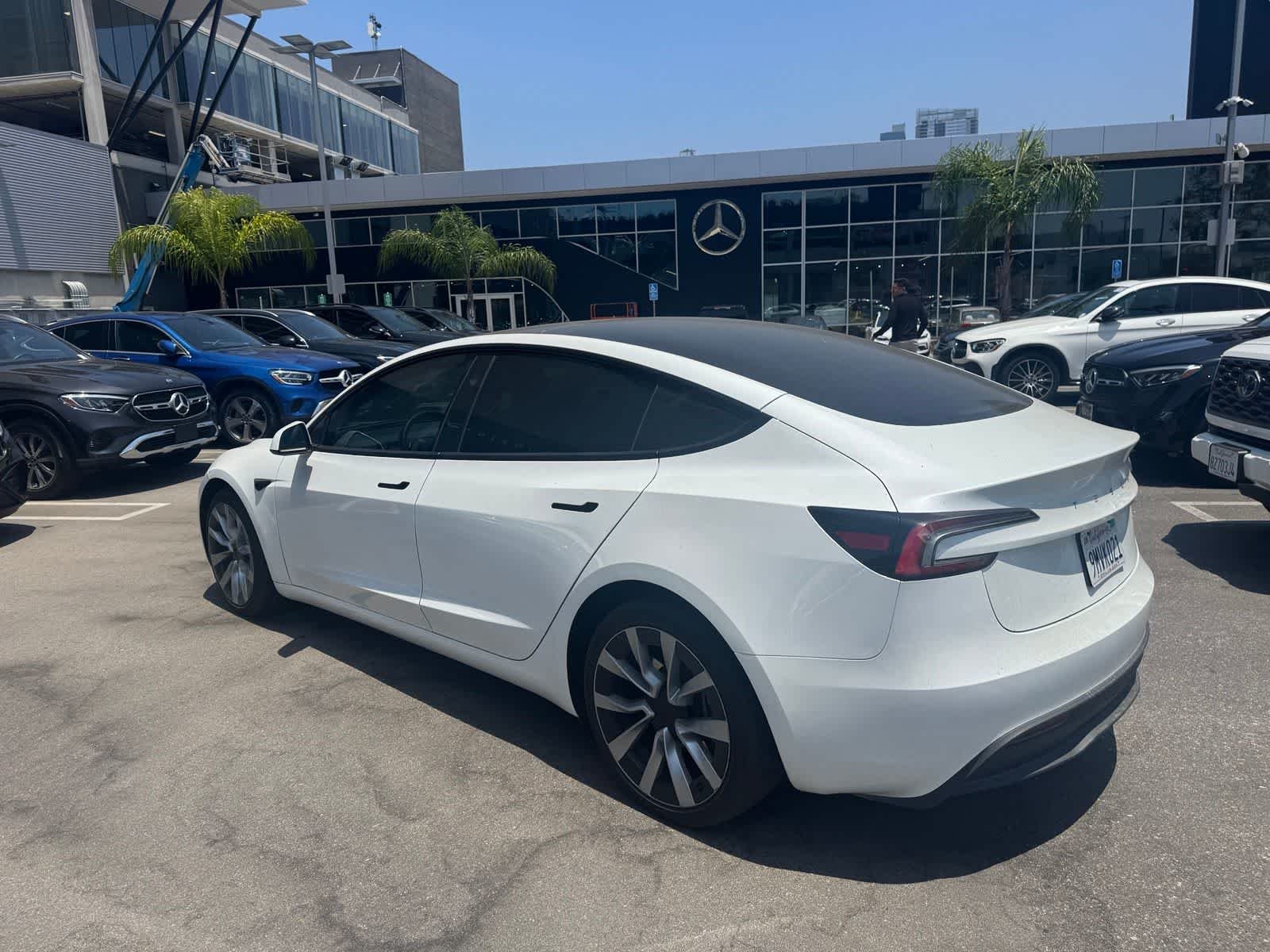 Used 2024 Pearl White Multi-Coat Tesla  image 4