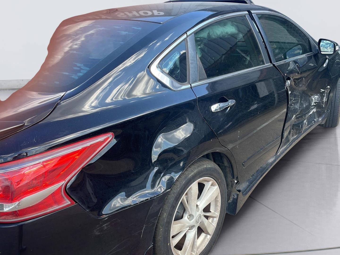 Used 2013 Super Black Nissan 2.5 SV image 4