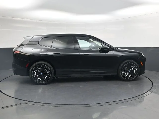 Used 2024 Black Sapphire Metallic BMW xDrive50 image 3