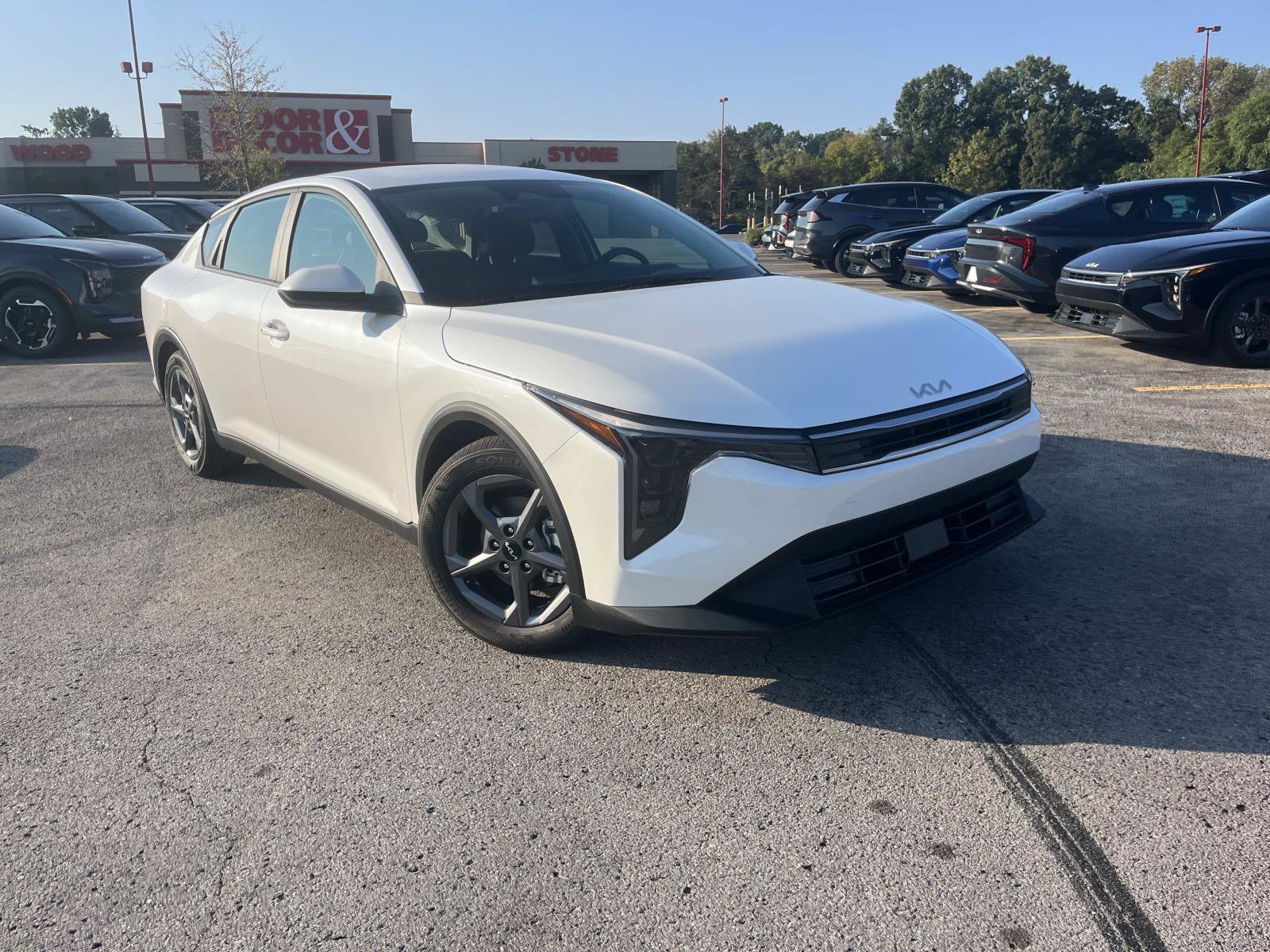 New 2026 Snow White Pearl Kia LXS image 1
