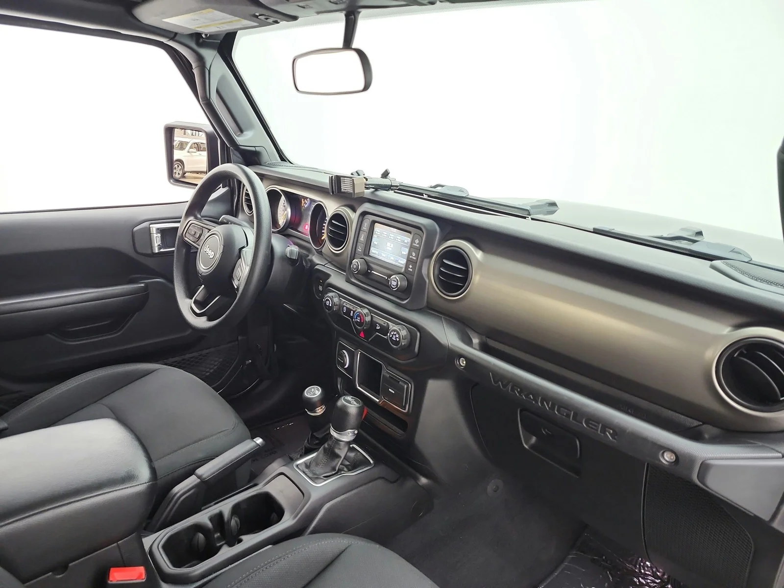 Used 2018 Granite Crystal Metallic Clearcoat Jeep Sport image 17