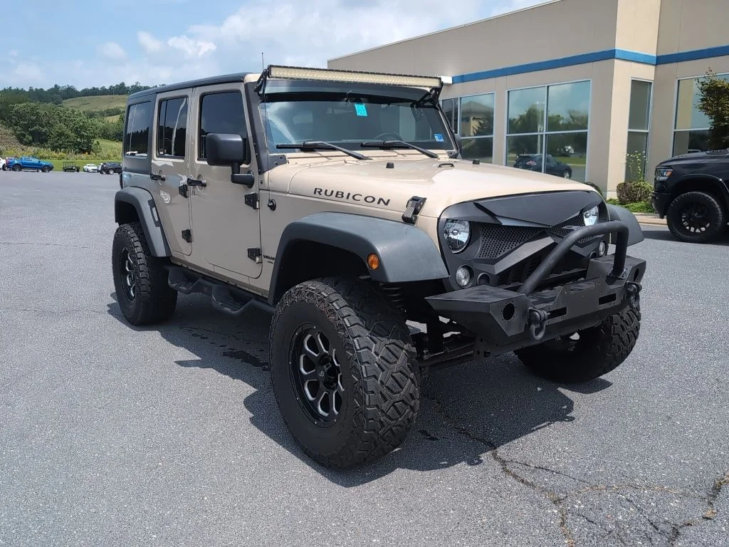 Used 2016 Beige Jeep Unlimited Rubicon image 1