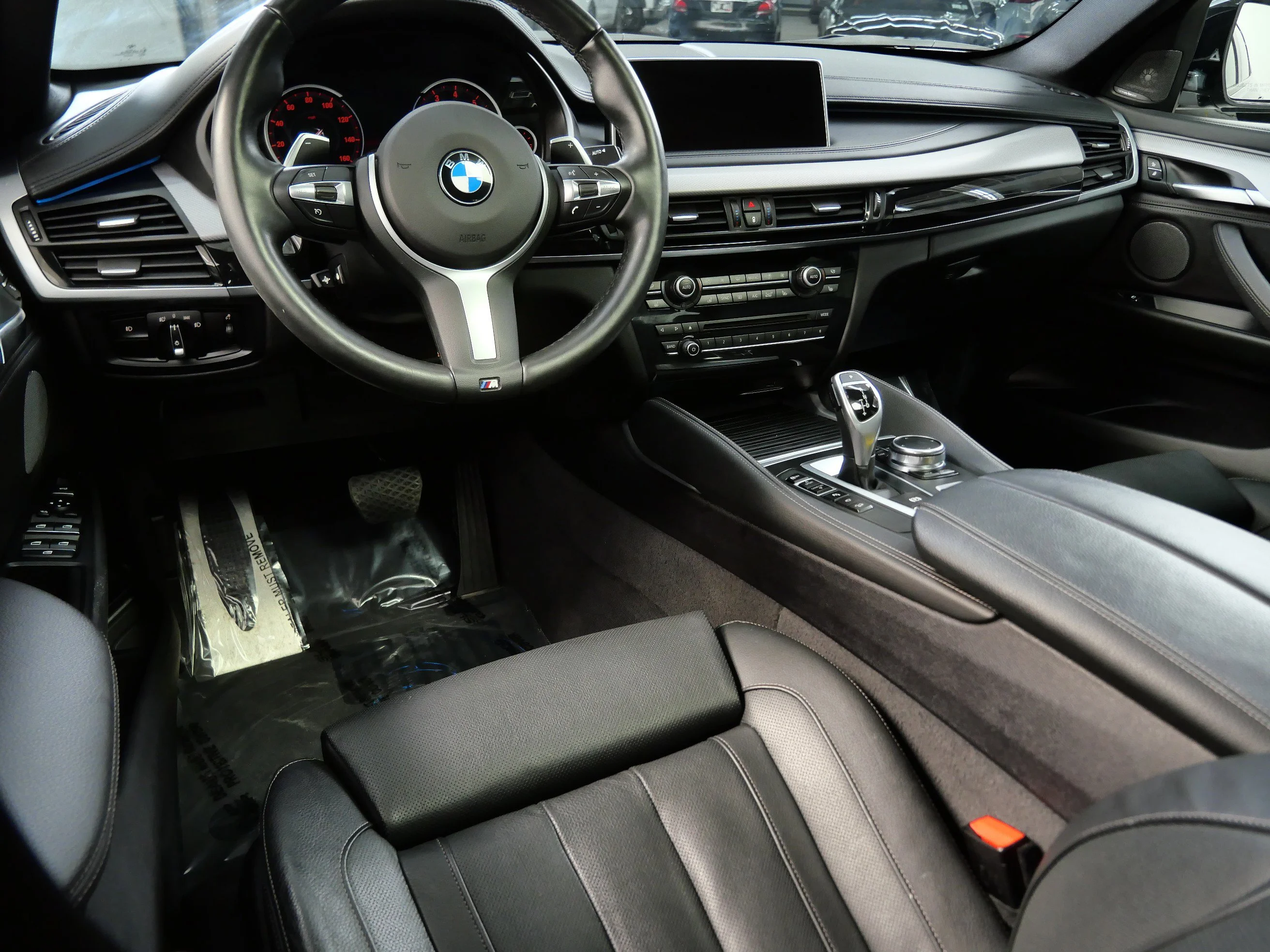 Used 2018 BMW X6 xDrive50i with VIN 5UXKU6C58J0Z66636 for sale in Minnetonka, Minnesota