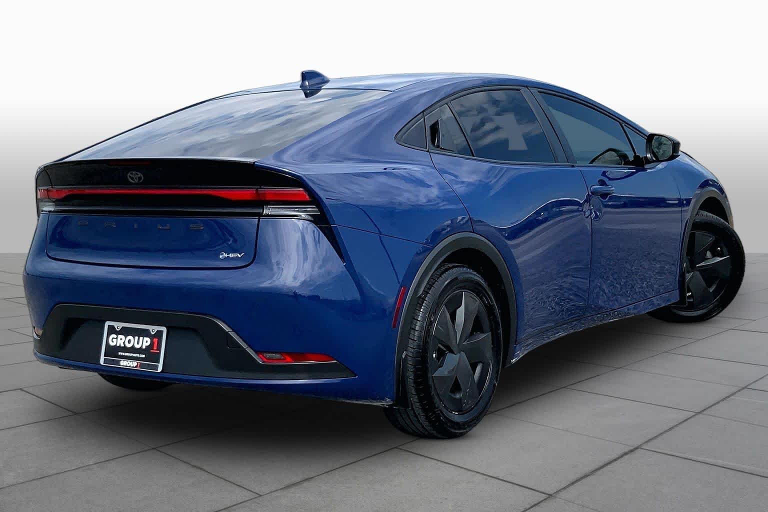 Used 2025 Reservoir Blue Toyota LE image 13