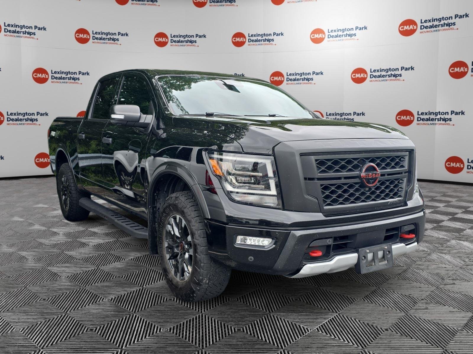 Used 2023 Super Black Nissan PRO-4X image 1