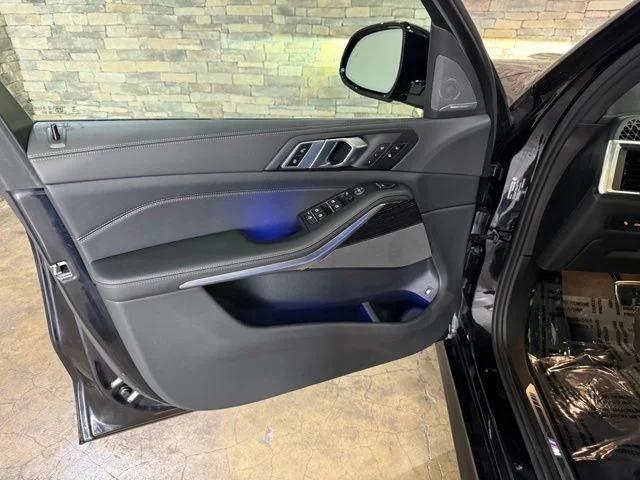 Used 2025 Black Sapphire Metallic BMW xDrive50e image 9