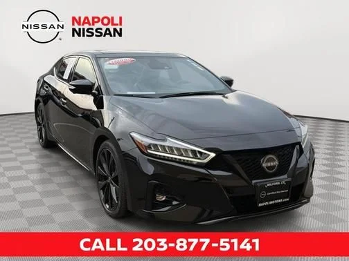 Certified Used 2023 Black Nissan SR image 1