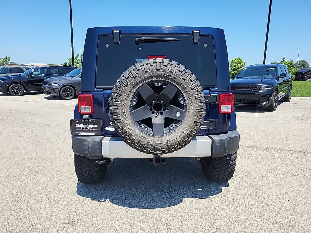 Used 2013 Blue Jeep Unlimited Sahara image 4