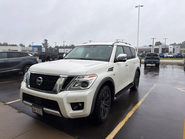 Used 2018 Pearl White Nissan Platinum image 1
