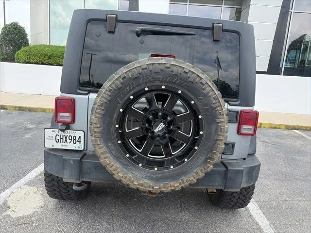 Used 2015 Silver Jeep Unlimited Sport image 6