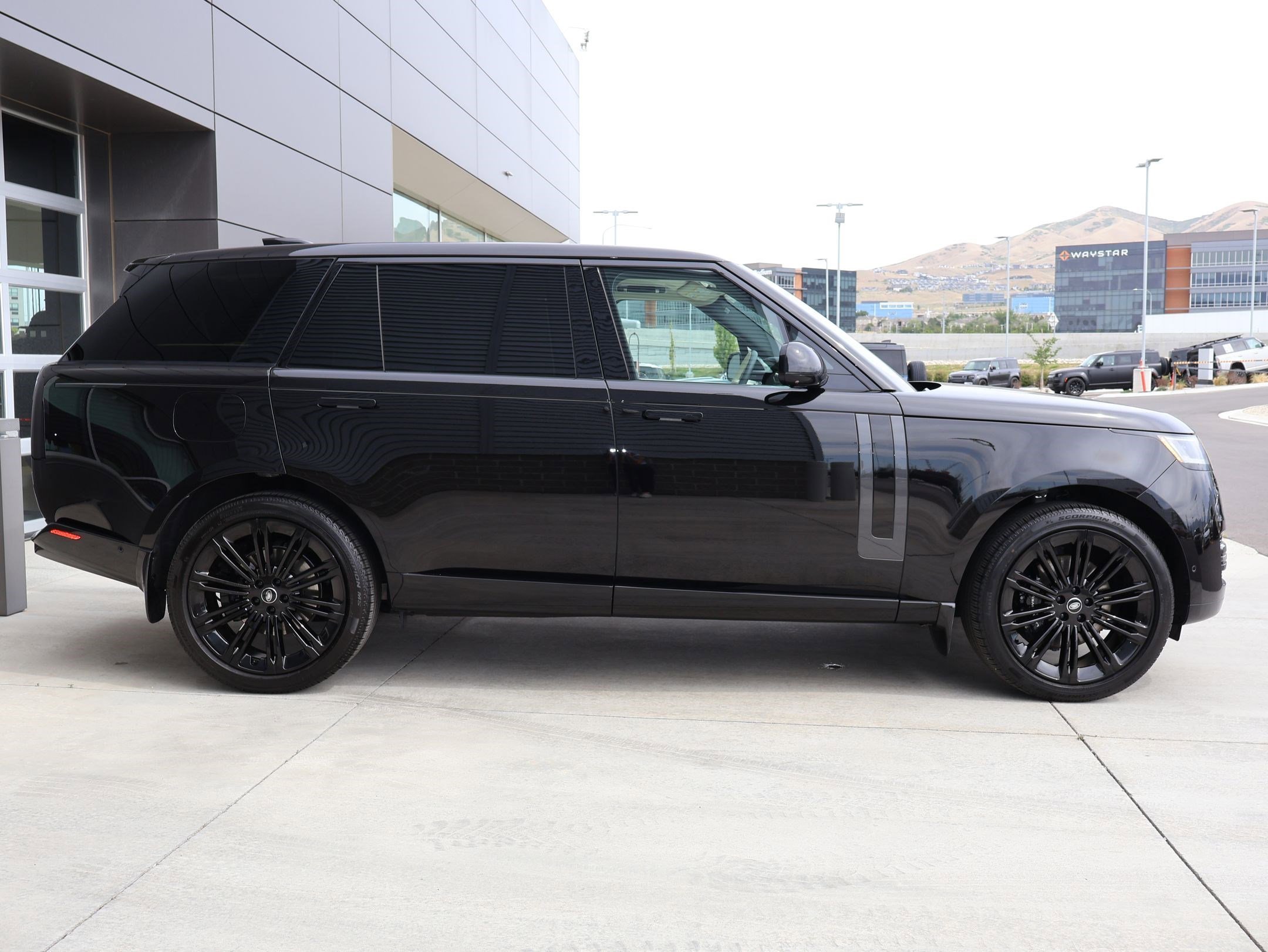Certified Used 2025 Obsidian Black Metallic Land Rover SE image 4