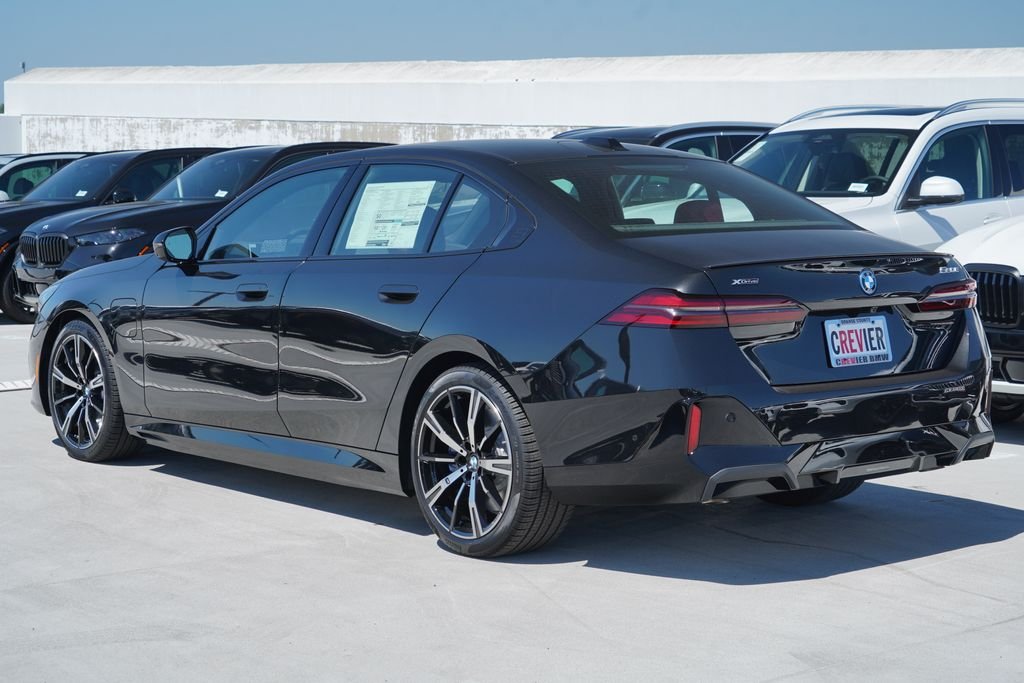 New 2027 Black Sapphire Metallic BMW 550e xDrive image 11