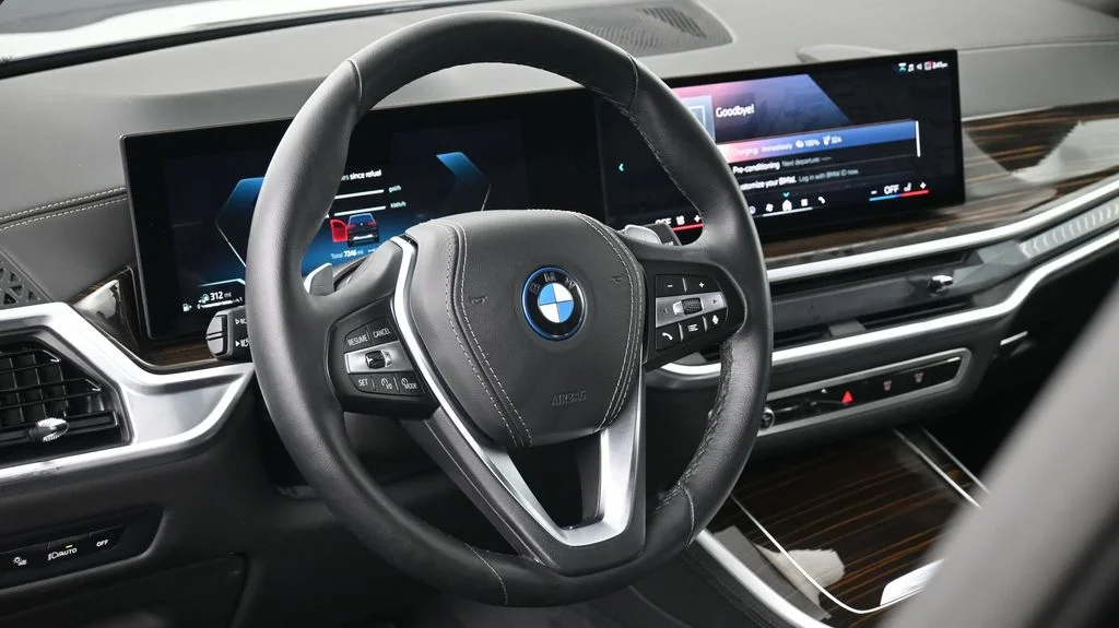 Certified Used 2025 Black BMW xDrive50e image 11