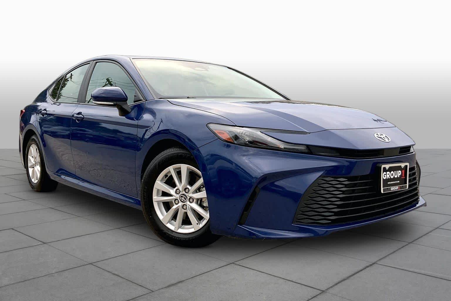 Used 2025 Reservoir Blue Toyota LE image 3
