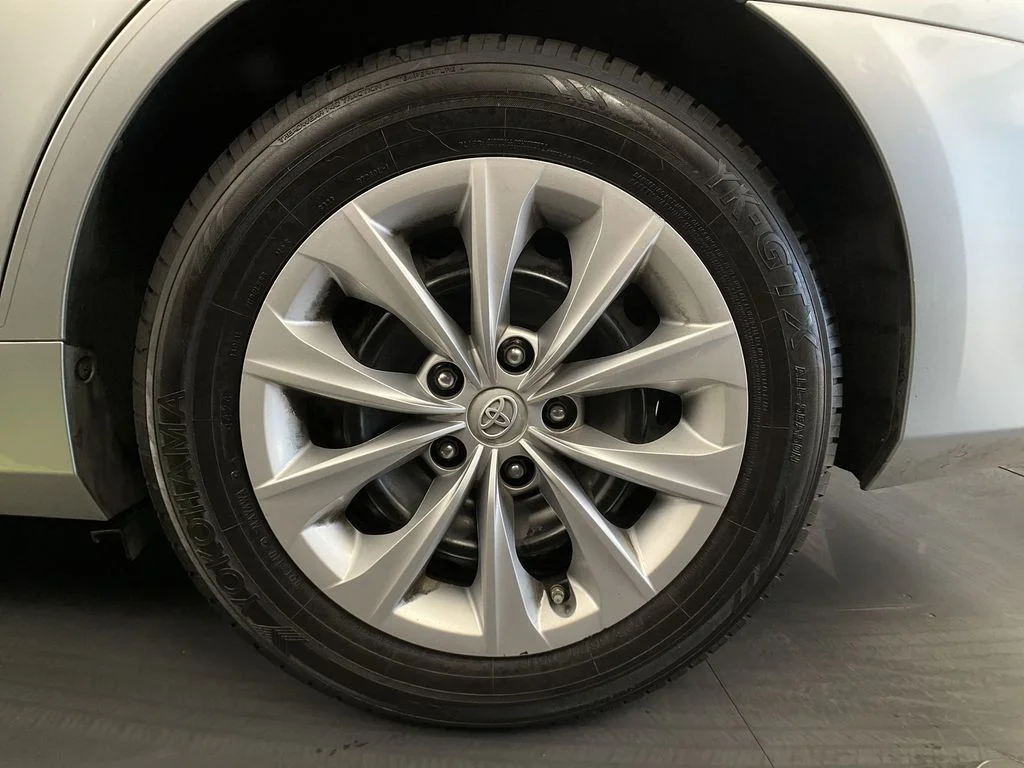 Used 2016 Celestial Silver Metallic Toyota LE image 25